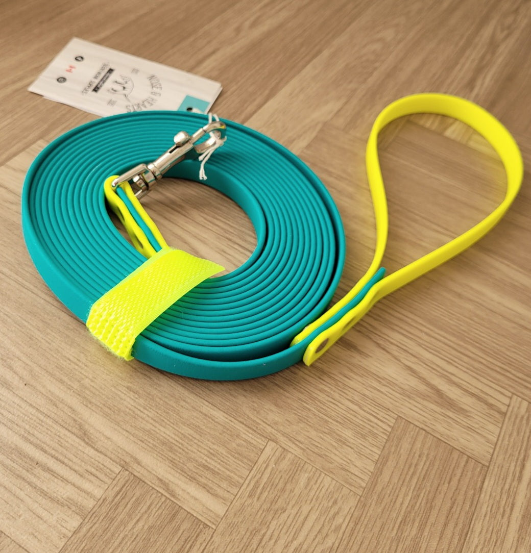 Teal with neon yellow accents with silver 2" long clasp