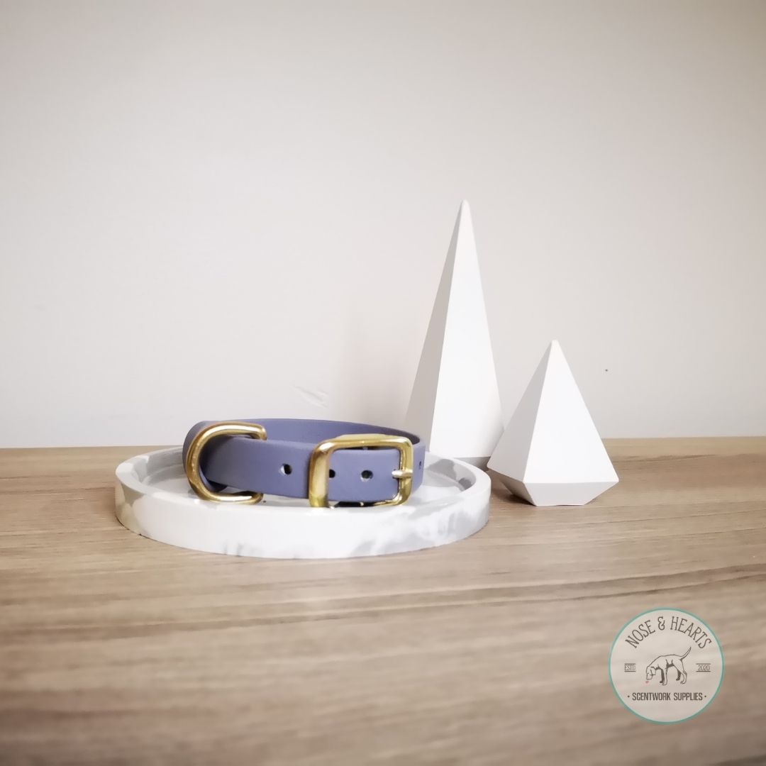 Light grey with brass hardware