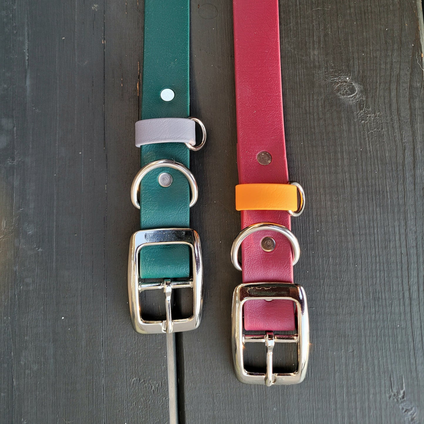Hunter green with grey strap keeper and red wine with mandarin orange strap keeper
