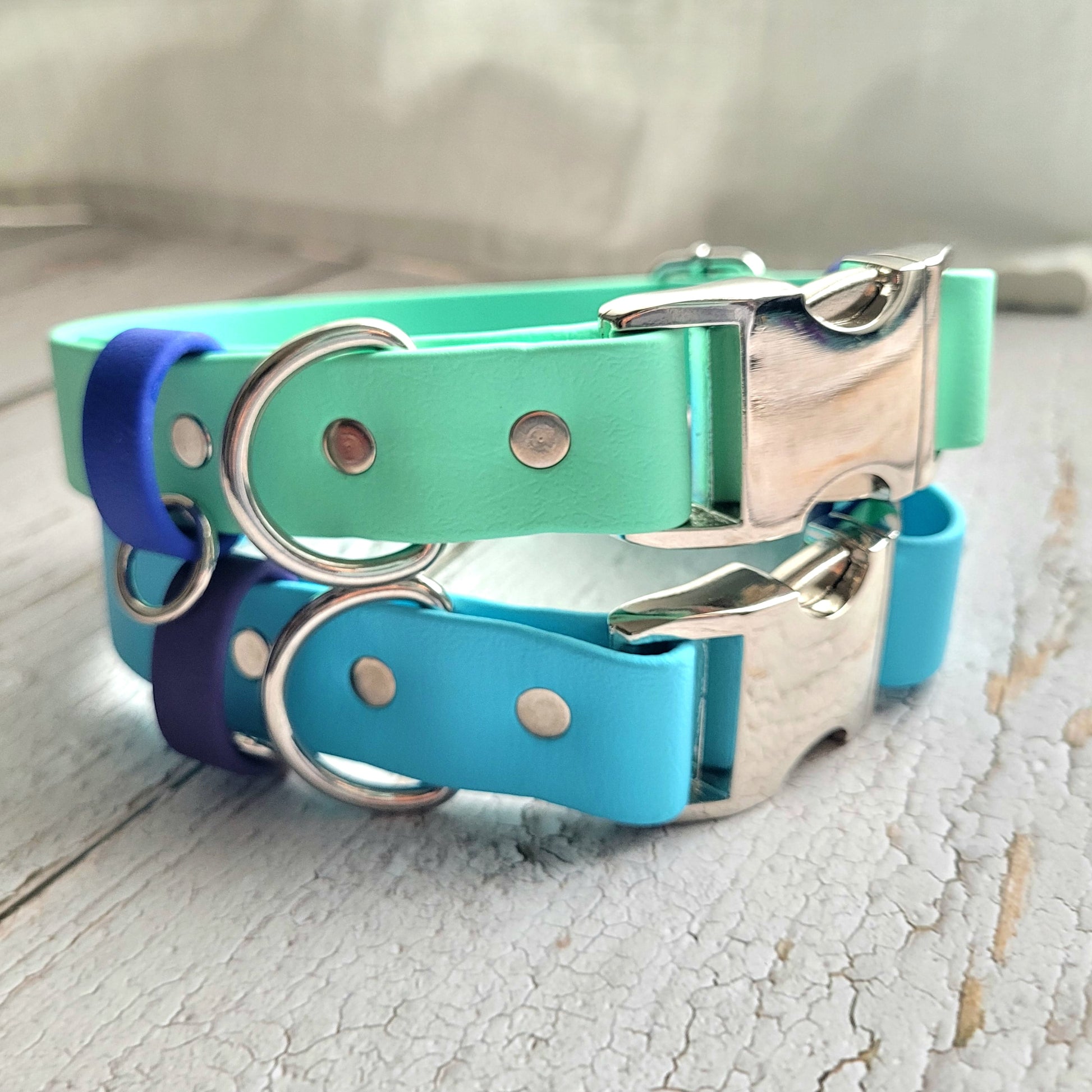 Sea foam green with royal blue strap keeper.  Sky blue with purple strap keeper