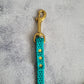 Teal with brass 3" clasp