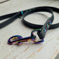 Black with rainbow 3" long clasp. 3ft long 