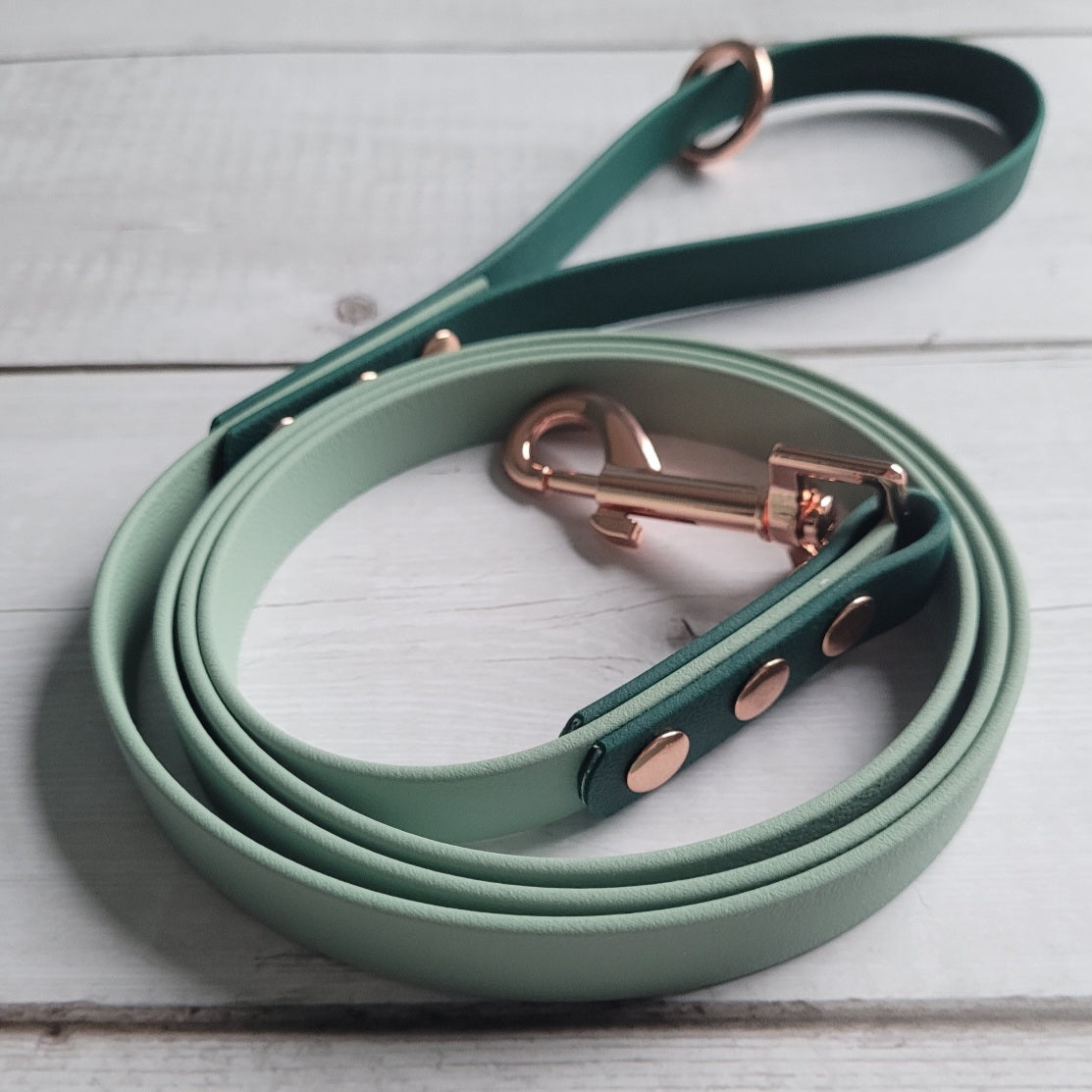 Sage green with hunter green accents with a 2.75" rose gold clasp