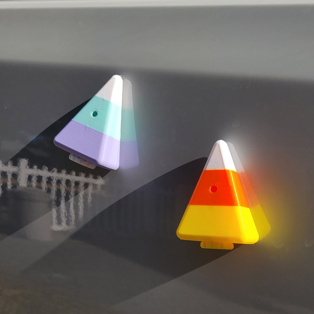 Candy Corn Vessels for nosework mounted on a magnetic surface like a vehicle makes it easy to setup your hides