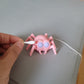Fitting a Q-tip into the Pink Spider Vessel. Q-tip not included. This Q-tip is does not have odour and just being used for demonstration purposes. Please use proper odour handling techiniques.