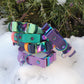 Top to bottom to right: Sea foam & hunter green strap. Teal & coral pink strap. Navy blue & Mandarin orange strap. Amethyst & amethyst strap. Purple & lavender strap