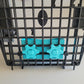 The inside of the door of the basket. Shown on a medium Ruffland door in turquoise 