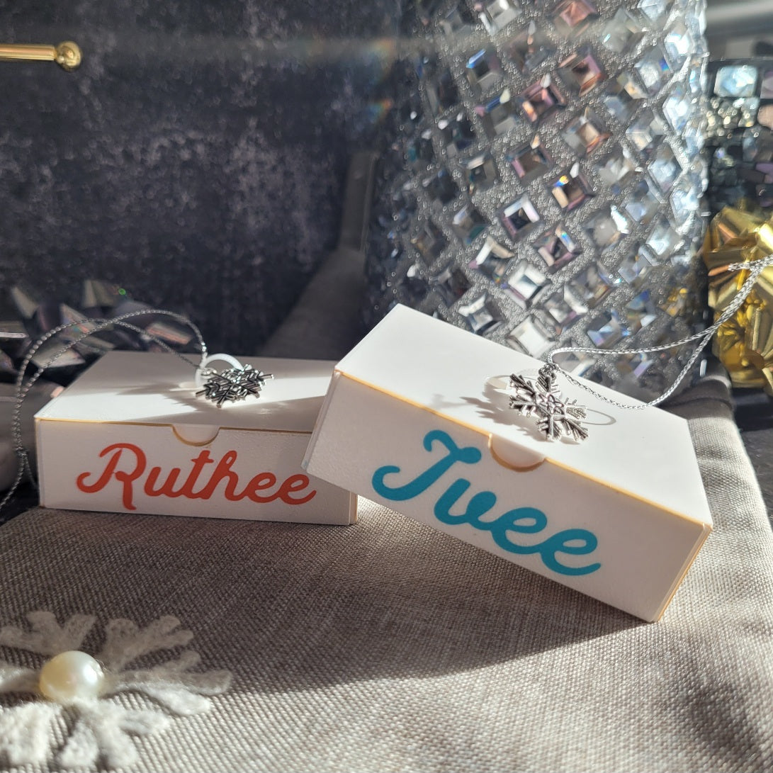 Orange (Ruthee) and turquoise Hanley script font